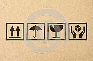 Black fragile symbol on cardboard