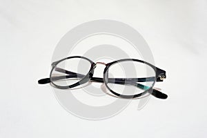 black frame eye glasses againts white background