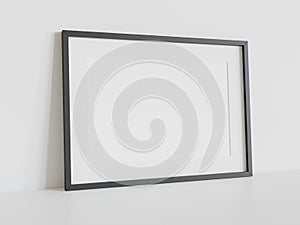 Black frame leaning on white floor in interior mockup. Template of a picture framed on a wall 3D rendering