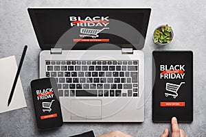 Black friday concept on laptop, tablet and smartphone screen