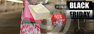 Black Friday cover banner for social media or other background, with woman and shopping bag. Black Friday concept