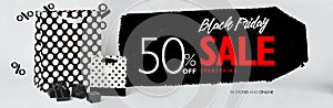 Black Friday sale banner, with small black gift-boxes, and black and white gift-bags with polka dots.