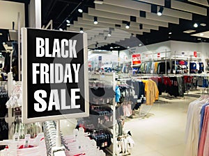 Black Friday sale. Black stand discount price in shop. Seasonal sale, shopping and store concept.