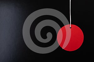 Black Friday sale concept. Circle Red sale tag color on the black background with Copy space