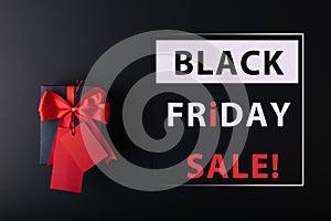 Black Friday sale concept. Red Sale tag  and Black Sale tag color on the black background with Copy space. Black Friday weekend