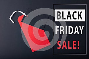 Black Friday sale concept. Red Sale tag  and Black Sale tag color on the black background with Copy space. Black Friday weekend