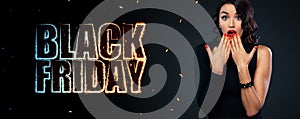 Sale offer. Shopping discount. Black Friday Concept. Girl isolated on dark background at shopping. Neon sign at