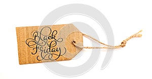 Black Friday Sale message sign on brown paper sale tag on white background