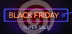 Black Friday sale neon sign. Brick wall as a background. Seasonal sale, shopping and store concept