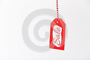 Black friday sale. Red price tag with sale sticker isolated on white background.