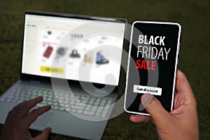 Black friday sale. special offer discount text on mobile phone screen message. Get promotional code for discounted purchases