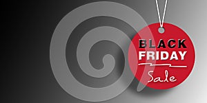 Black Friday sale tag banner with light and shadow on dark background. Concept for Black Friday Sale.