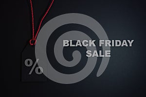 Black friday sale tag on dark background