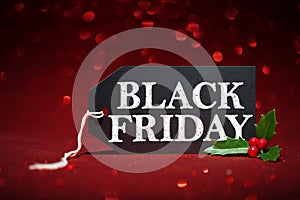 Black Friday sale tag on red background