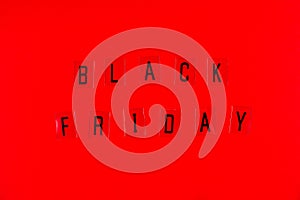 Black Friday sale tag on red background