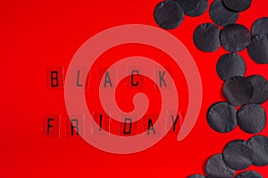 Black Friday sale tag on red background