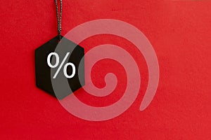 Black friday. Sale tag on the red background
