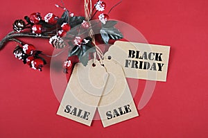 Black Friday sale tags with Christmas decorations