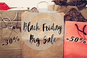 Black friday sale text. big sale offer discount sign on paper ba