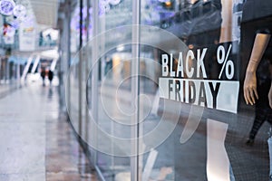 black friday sign on store display background in a mall during christmas holidays