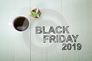 Black Friday 2015 text with a cup of coffee