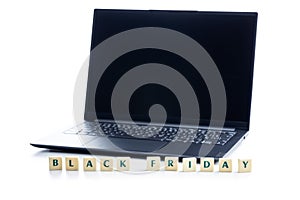 Black friday text and laptop isolated on white background
