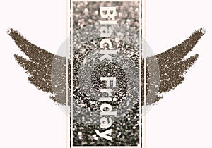 Black Friday - text on rectangular background with abstract wings of black glitter