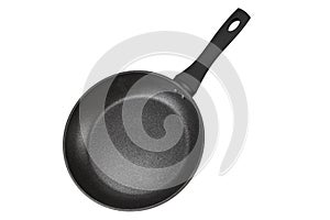 Black frying pan with nonstick surface isolated on white background, close-up