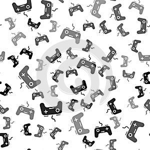 Black Gamepad icon isolated seamless pattern on white background. Game controller. Vector