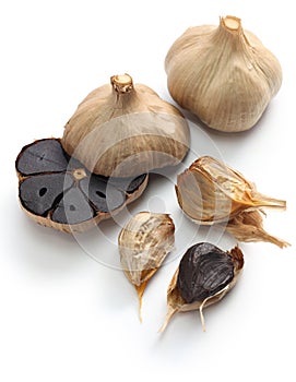 Black garlic bulbs and cloves
