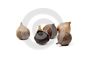 Black garlic isolated on white background