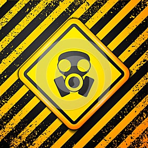 Black Gas mask icon isolated on yellow background. Respirator sign. Warning sign. Vector photo