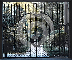 a black gate is shown with an ornate design on it