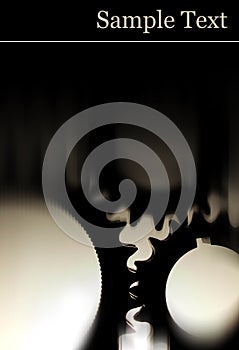 Black gears with black background with copy space