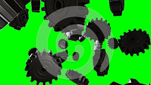 Black gears on green chroma key background.