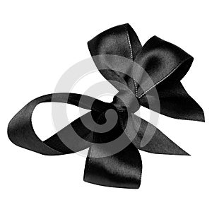 Black gift bow of satin ribbon isolated on white background. Christmas decoration for holiday gift box