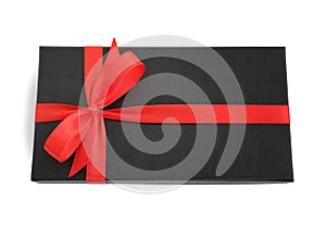 Black gift box (present) with red satin ribbon bow