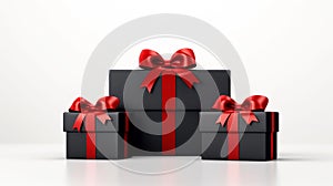 Black gift boxes with red ribbon bow on white background. Black Friday concept