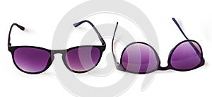 Black glasses frame on white background.