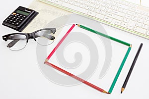 Black glasses and keyboard and calculator,business concept photo