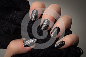Black glittered nails