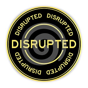 Black and gold round sticker with word disrupted on white background