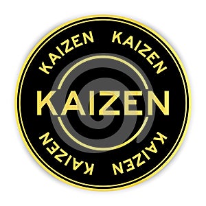 Black and gold round sticker with word kaizen on white background