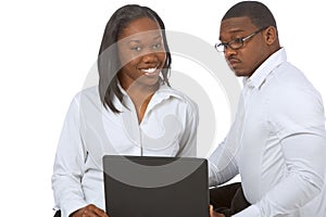 Black graduates people by laptop in high school