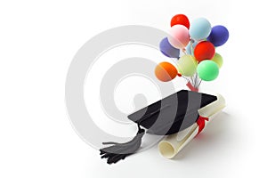 Black Graduation Cap, Degree and balloons Isolated on White Background.