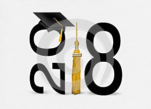 Black 2018 graduation cap with gold tassel