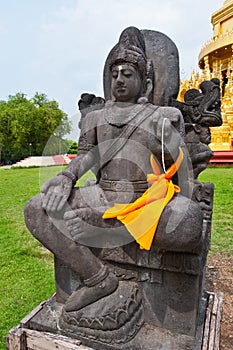 Black graven statue at Wat Pasawangboon temple