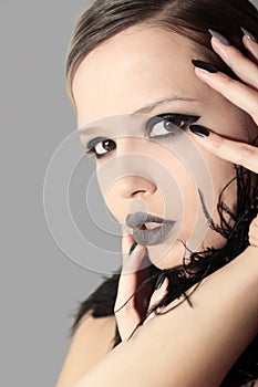 Black gray glam matte manicure and makeup.