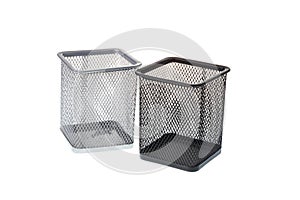 Black and gray metal mesh desk organizers for pens, isolated on white background