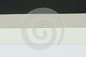 Black, gray and white construction paper